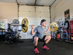 barbell back squat in a crossfit box